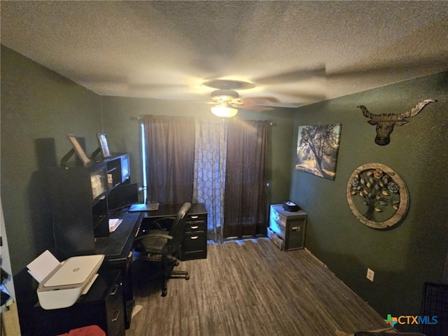 office area with wood-type flooring, a textured ceiling, and ceiling fan