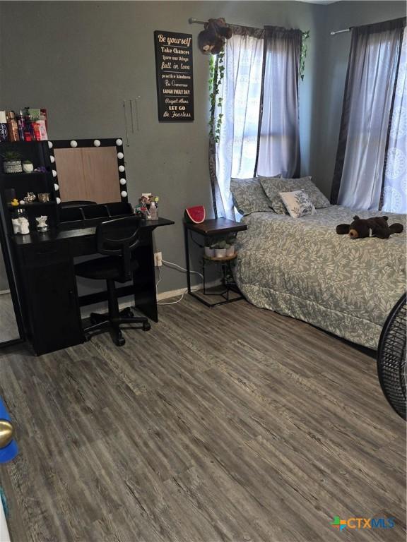 2301 Jake Dr, Copperas Cove, TX 76522 - bedroom with wood finished floors and baseboards