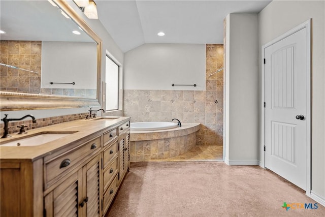 bathroom with lofted ceiling, recessed lighting, a sink, tiled shower, and a bath