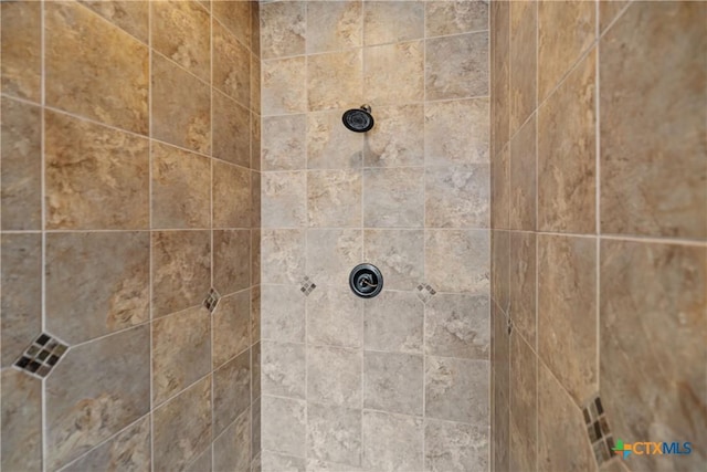 details featuring a tile shower