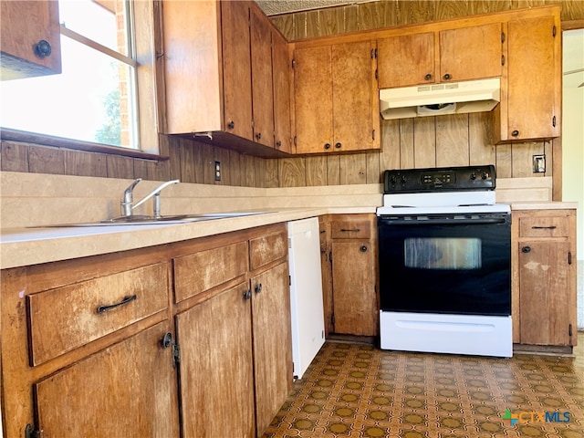 kitchen with sink and white appliances