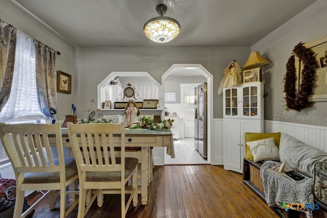 dining area with hardwood / wood-style floors