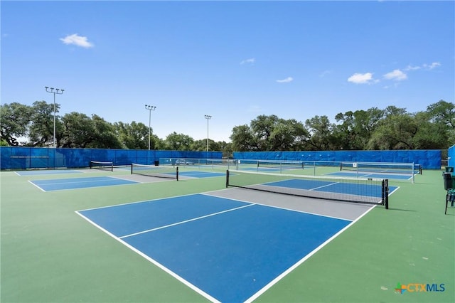 18917 Peckham Dr, Lago Vista, TX 78645 - view of tennis court featuring community basketball court