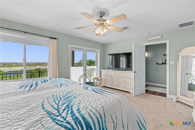 18917 Peckham Dr, Lago Vista, TX 78645 - bedroom featuring carpet, access to outside, and a ceiling fan
