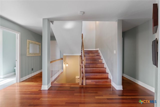 18917 Peckham Dr, Lago Vista, TX 78645 - staircase with wood finished floors and baseboards