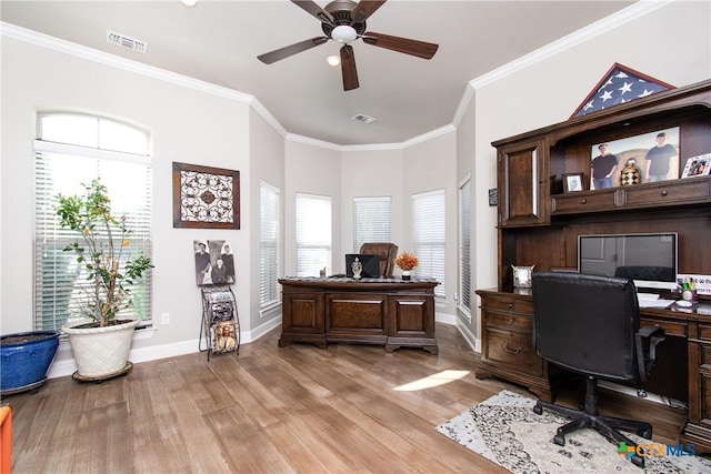 home office featuring ceiling fan, ornamental molding, and light hardwood / wood-style flooring