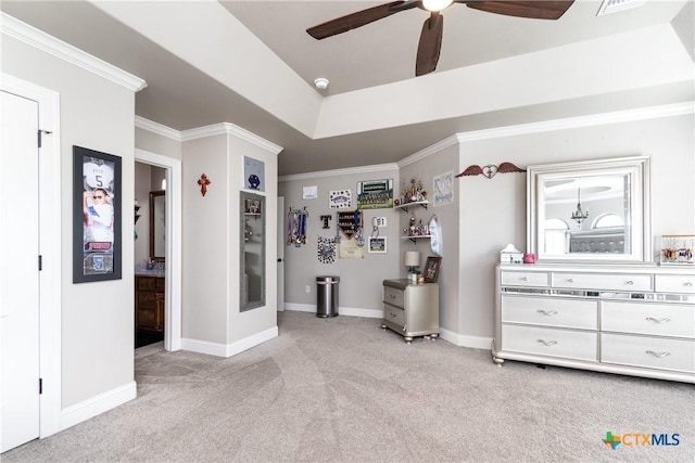 carpeted bedroom featuring ceiling fan and ornamental molding