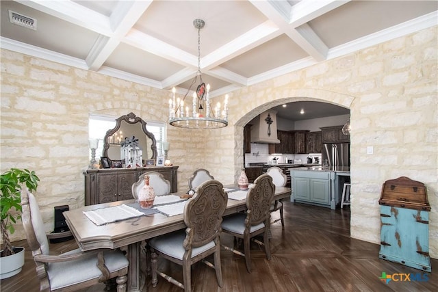 dining area featuring beamed ceiling, dark parquet floors, coffered ceiling, and an inviting chandelier