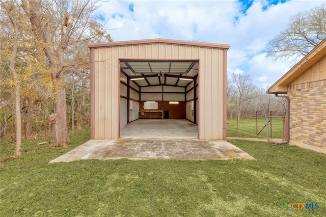 view of outdoor structure featuring a yard