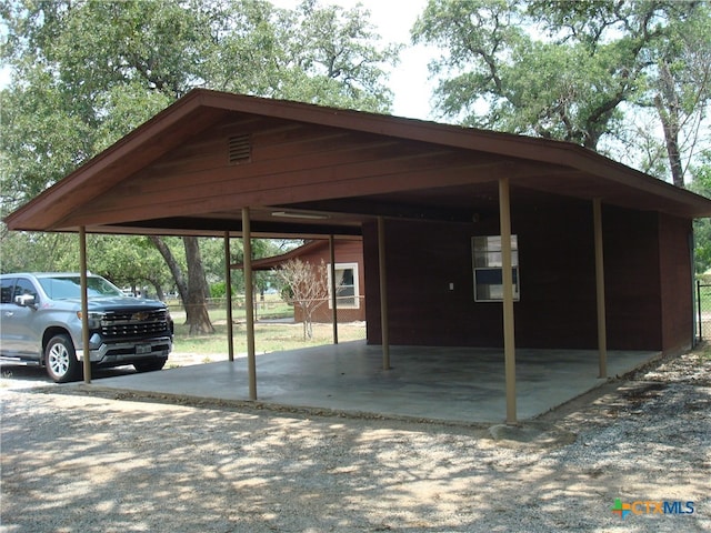 view of car parking with a carport