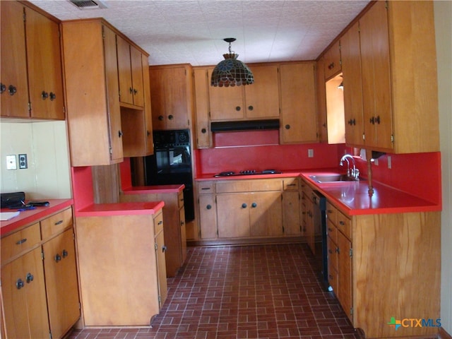 kitchen featuring black appliances and sink