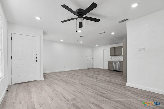 unfurnished living room featuring light wood-style floors, visible vents, and recessed lighting