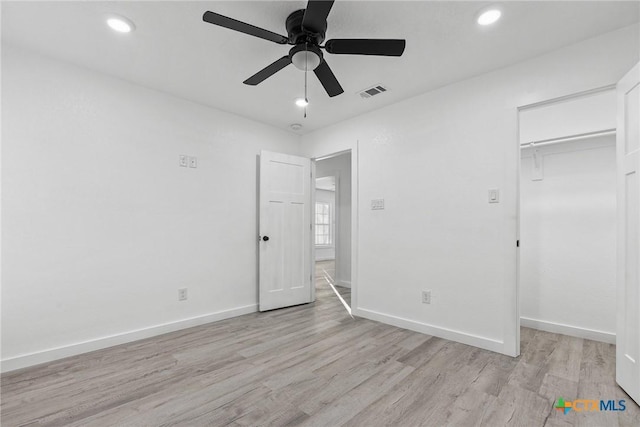 unfurnished bedroom with recessed lighting, visible vents, light wood-style flooring, and baseboards