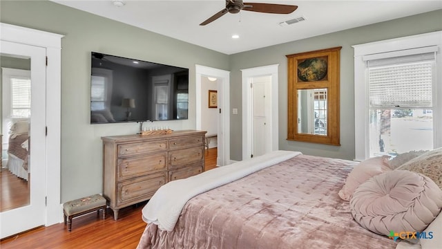 bedroom featuring ceiling fan and hardwood / wood-style floors