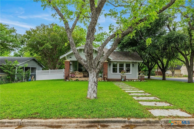 view of front of property with a front lawn