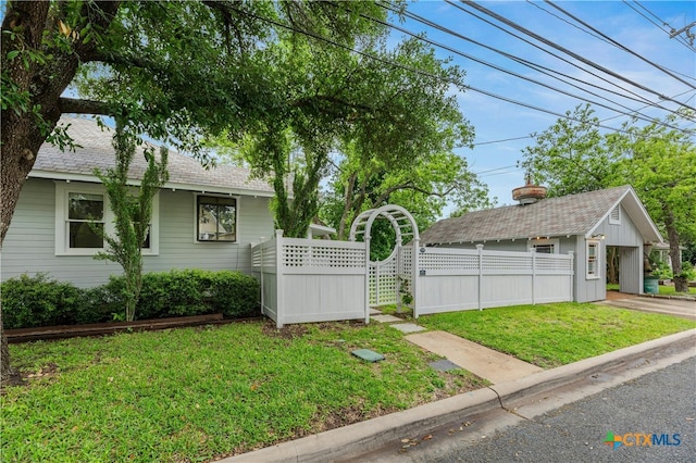 view of front of home with a front yard