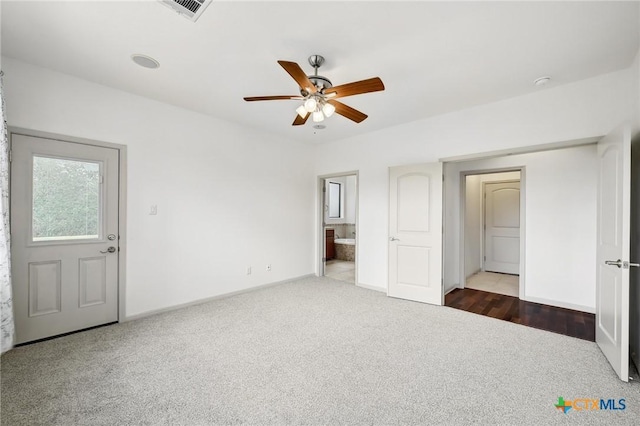 14424 Tuscola Cir, Austin, TX 78734 - unfurnished bedroom with carpet flooring, connected bathroom, and ceiling fan