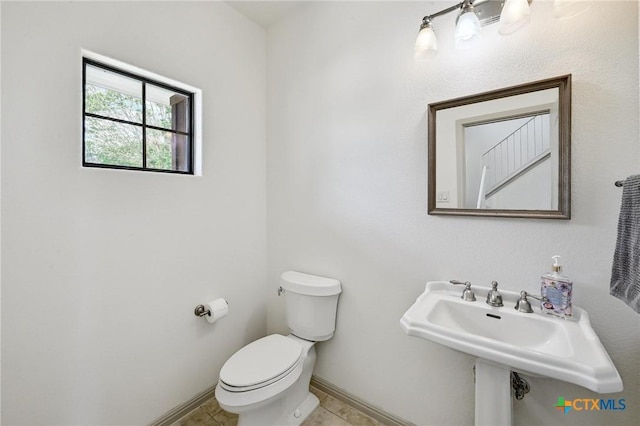 14424 Tuscola Cir, Austin, TX 78734 - half bathroom featuring toilet and tile patterned floors