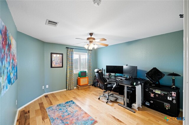 office area featuring hardwood / wood-style floors and ceiling fan