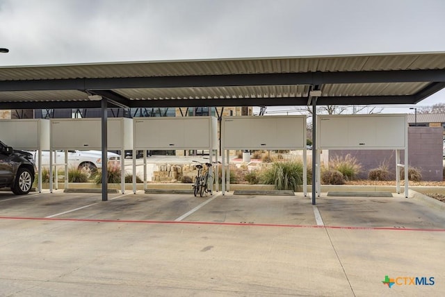 view of parking / parking lot with a carport