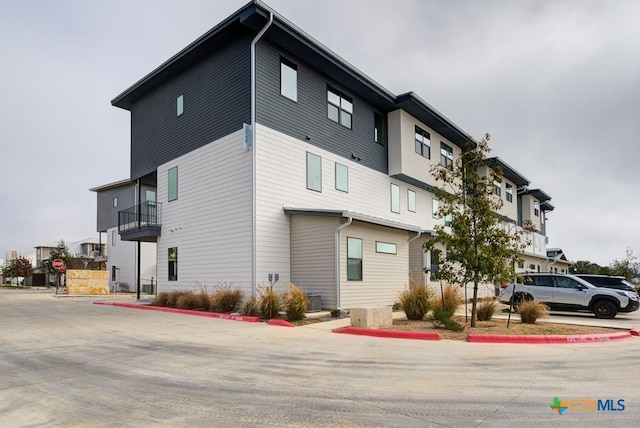 view of building exterior featuring cooling unit