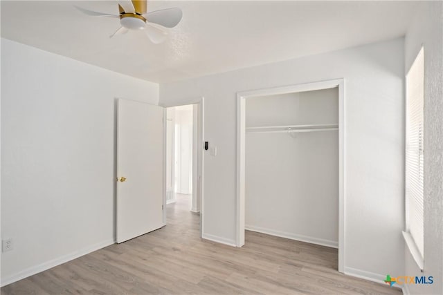 unfurnished bedroom featuring a closet, ceiling fan, and light hardwood / wood-style floors