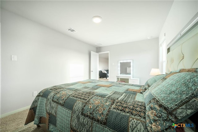 630 Golden Grove Pkwy, San Marcos, TX 78666 - carpeted bedroom featuring baseboards and visible vents