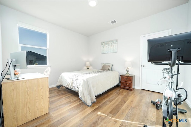630 Golden Grove Pkwy, San Marcos, TX 78666 - bedroom featuring visible vents, light wood-type flooring, and baseboards
