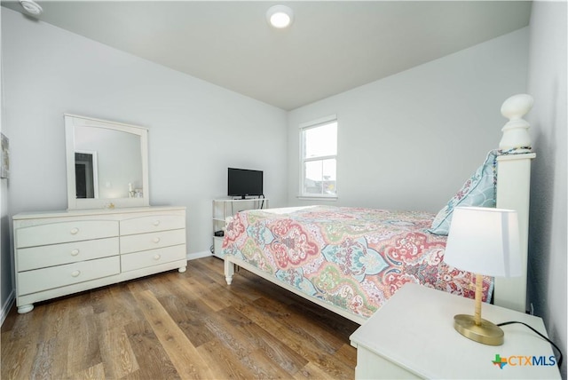 630 Golden Grove Pkwy, San Marcos, TX 78666 - bedroom with baseboards and wood finished floors