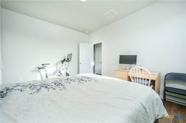630 Golden Grove Pkwy, San Marcos, TX 78666 - bedroom with dark wood-style floors and visible vents