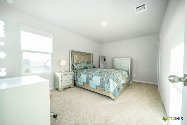630 Golden Grove Pkwy, San Marcos, TX 78666 - bedroom with light colored carpet, visible vents, and baseboards