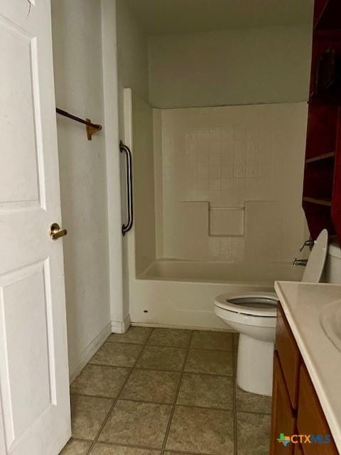 501 San Antonio St, Marlin, TX 76661 - full bath featuring vanity, tile patterned flooring, and bathing tub / shower combination