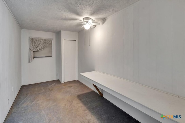 925 Eden Roc St, Victoria, TX 77904 - mudroom featuring a textured ceiling, carpet floors, and a ceiling fan