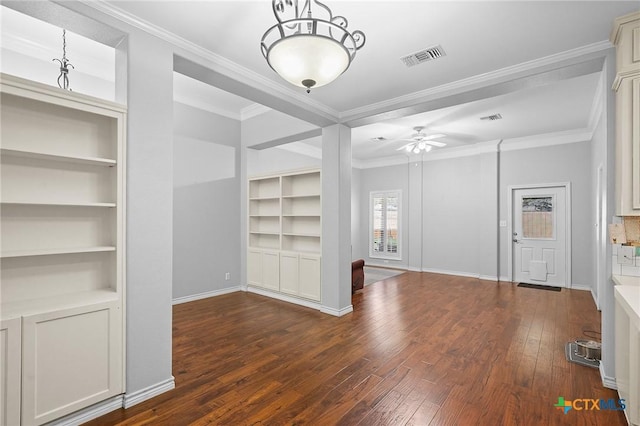 214 Belmoor Ln, Victoria, TX 77904 - empty room with wood-type flooring, a ceiling fan, built in features, and crown molding