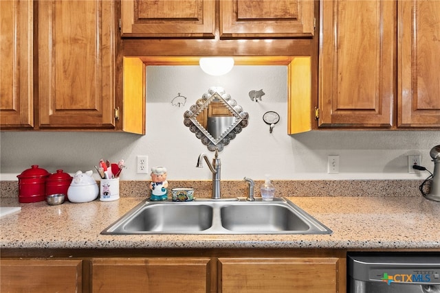 kitchen featuring black dishwasher and sink