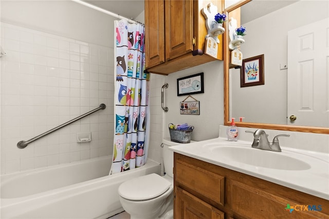 full bathroom featuring vanity, shower / tub combo, and toilet