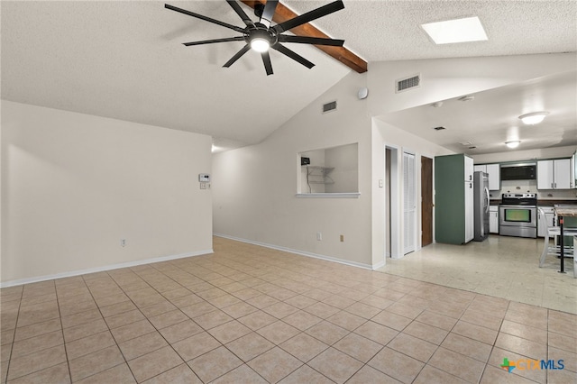 501 Geri Dr, Copperas Cove, TX 76522 - unfurnished living room featuring beam ceiling, light tile patterned flooring, ceiling fan, a textured ceiling, and high vaulted ceiling