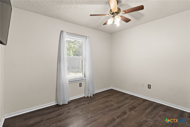 501 Geri Dr, Copperas Cove, TX 76522 - empty room featuring dark wood-style flooring, a ceiling fan, and a textured ceiling
