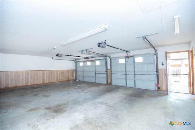 interior space with ceiling fan