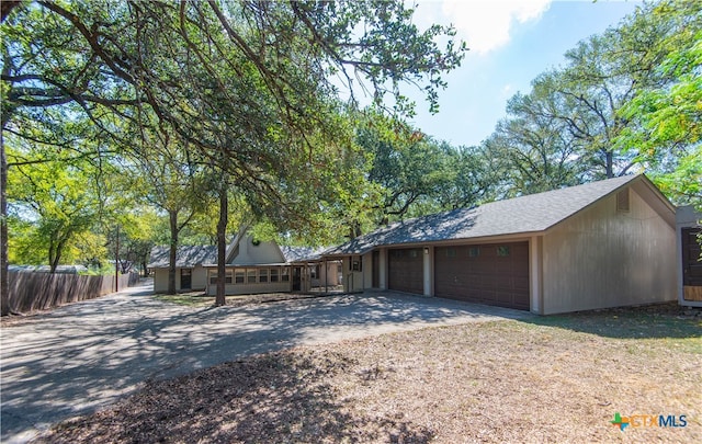 ranch-style home with a garage