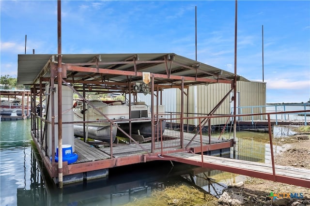 view of dock with a water view