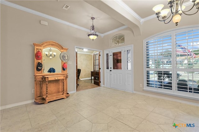 tiled foyer entrance featuring crown molding, beamed ceiling, and an inviting chandelier