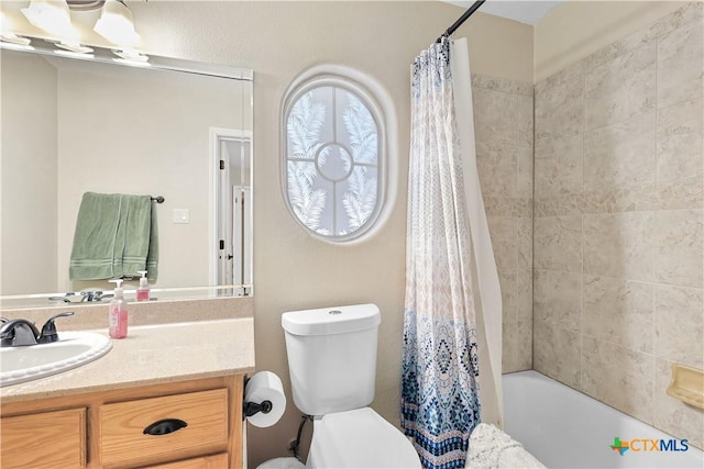 full bathroom with toilet, shower / bath combination with curtain, and vanity