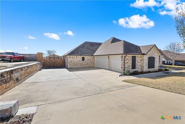 french provincial home featuring a garage