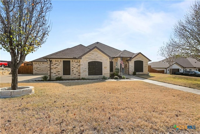 view of front of home with a front lawn