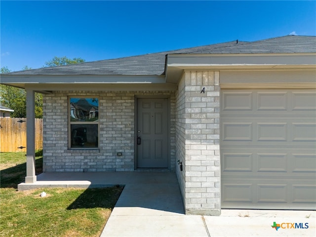 property entrance with a garage