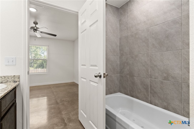 bathroom featuring concrete flooring, vanity, and ceiling fan