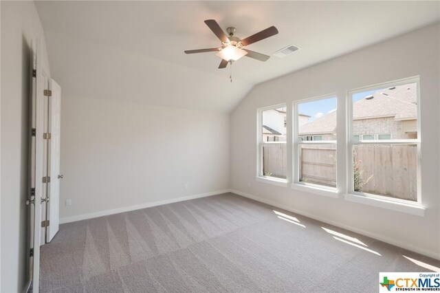 2258 Hoja Ave, New Braunfels, TX 78132 - additional living space featuring carpet flooring, baseboards, ceiling fan, and vaulted ceiling