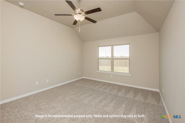 carpeted spare room featuring baseboards, a ceiling fan, and lofted ceiling