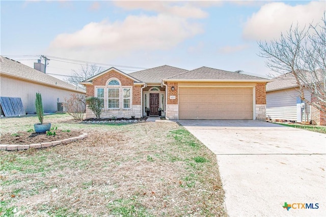 ranch-style house featuring a garage, central AC unit, concrete driveway, stone siding, and brick siding